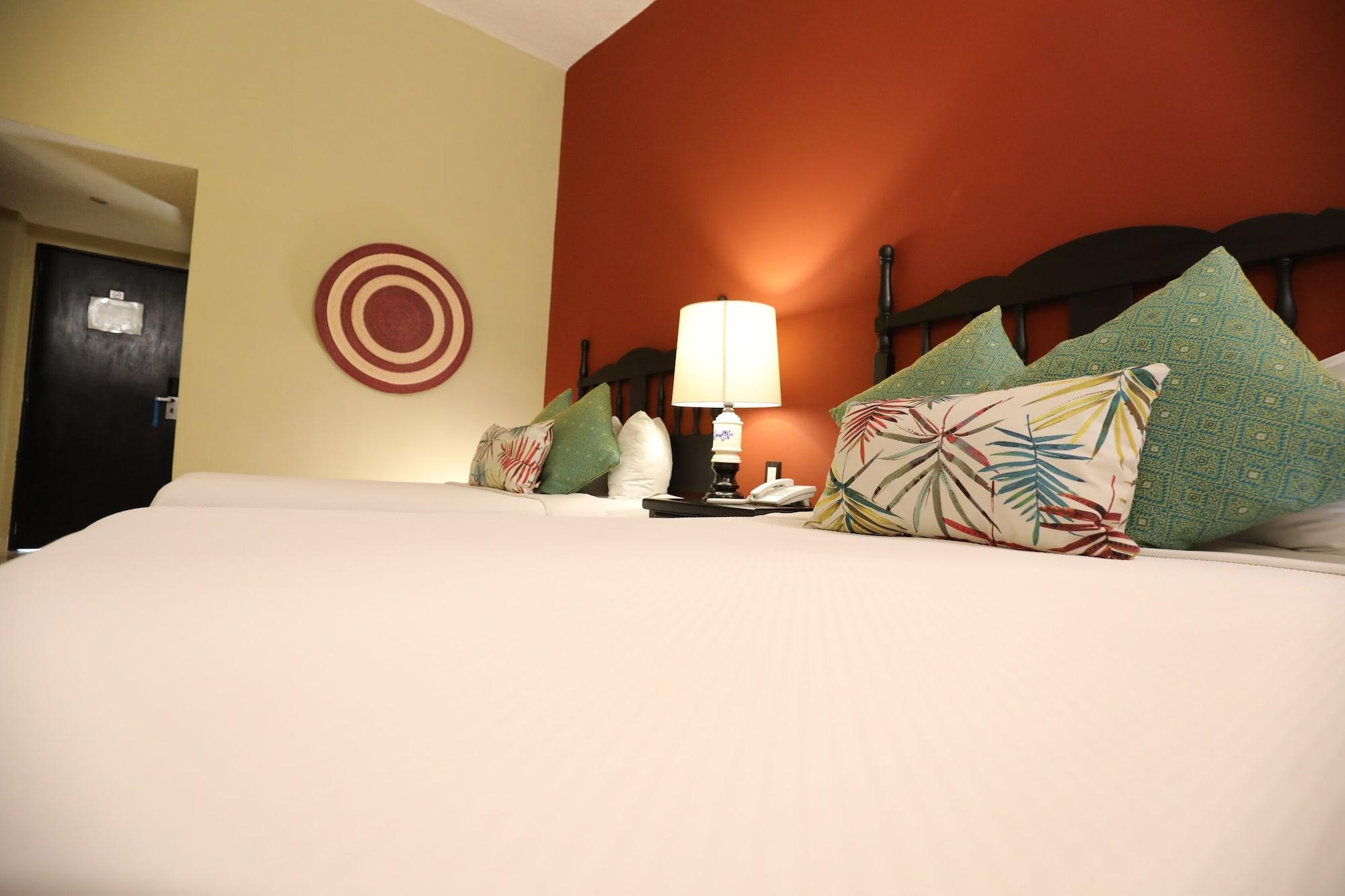 Hotel Montetaxco Extérieur photo A bed