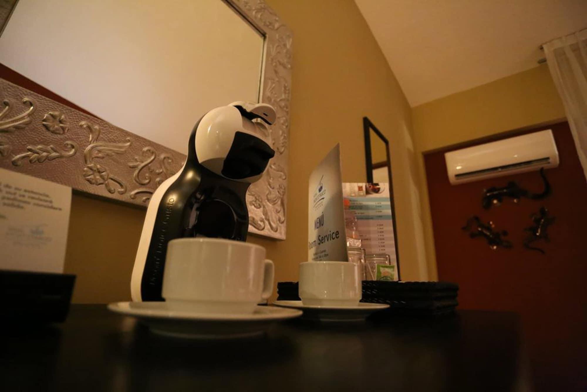 Hotel Montetaxco Extérieur photo A Dolce Gusto coffee machine