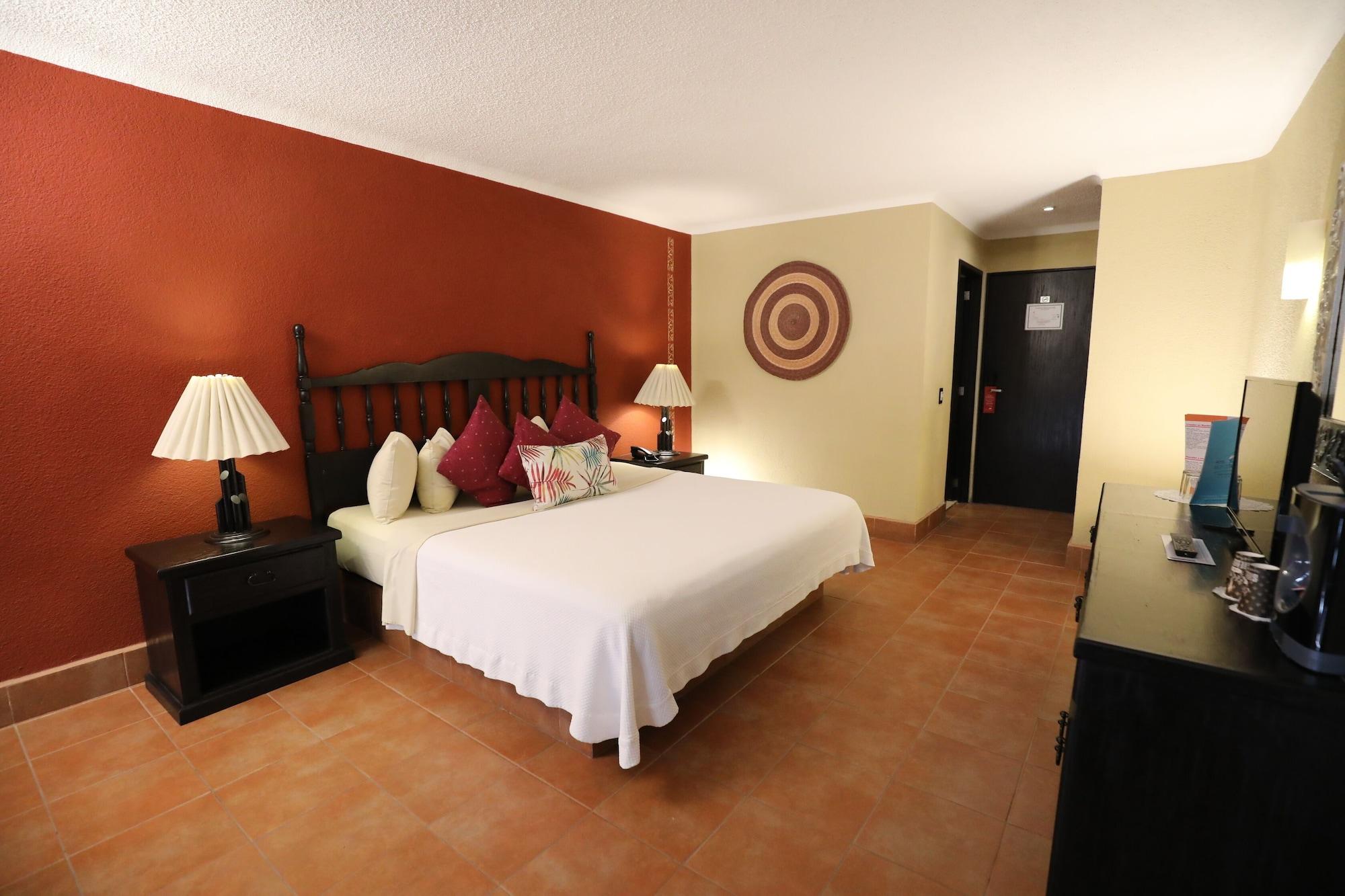 Hotel Montetaxco Extérieur photo A room at the hotel